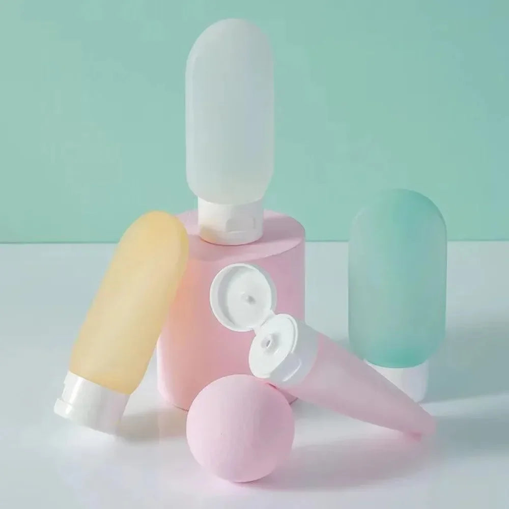 Travel Bottle Set – 4pcs Refillable 60ml + 12 Soft Tubes.
