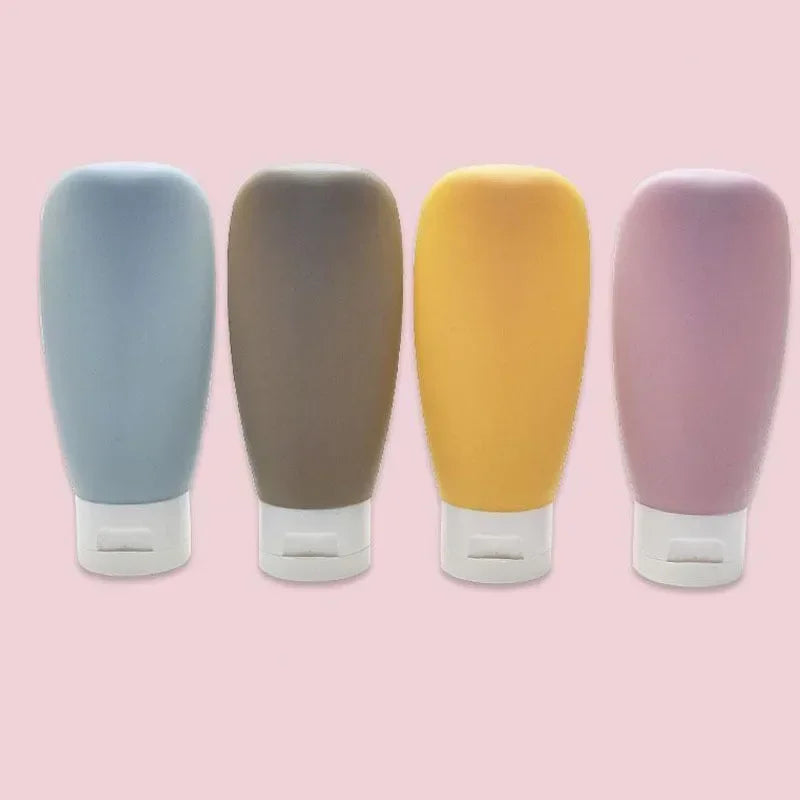 Travel Bottle Set – 4pcs Refillable 60ml + 12 Soft Tubes.